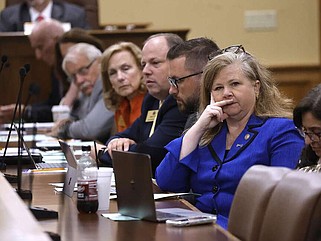 FILE - Rep. Rebecca Burkes (right), R-Lowell, and other committee members list as HB1007, to reduce state income tax rates, is presented during the House Committee on Revenue and Taxation on Wednesday, Sept. 13, 2023, at the state Capitol in Little Rock. (Arkansas Democrat-Gazette/Thomas Metthe)
